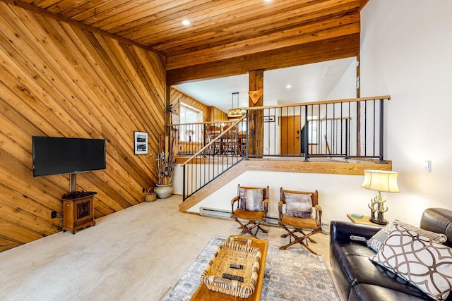 living room with light carpet, wooden ceiling, and wood walls