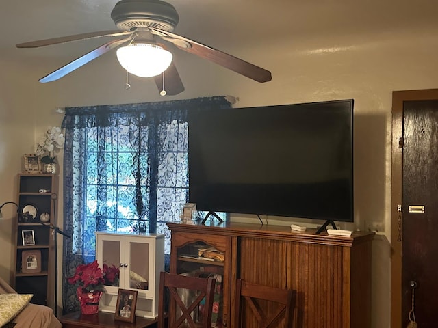 living room with ceiling fan