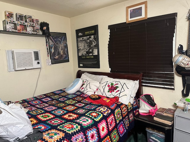 bedroom with a wall unit AC