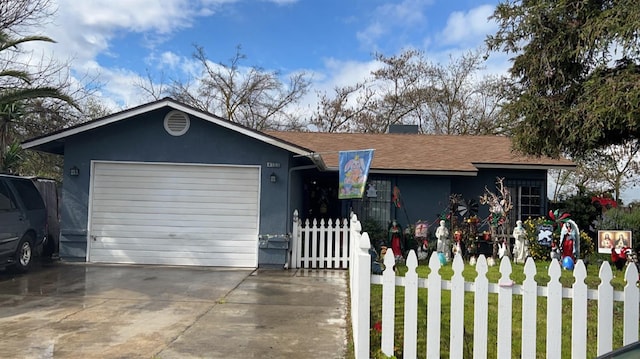 single story home featuring a garage