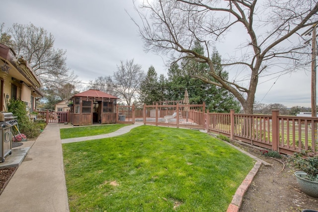 view of yard featuring a playground and fence