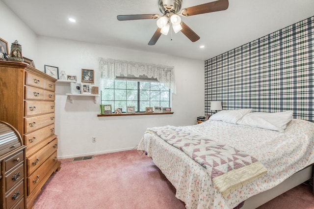 bedroom with visible vents, baseboards, recessed lighting, ceiling fan, and light colored carpet