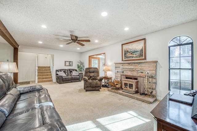 carpeted living room featuring stairway, recessed lighting, a textured ceiling, and ceiling fan