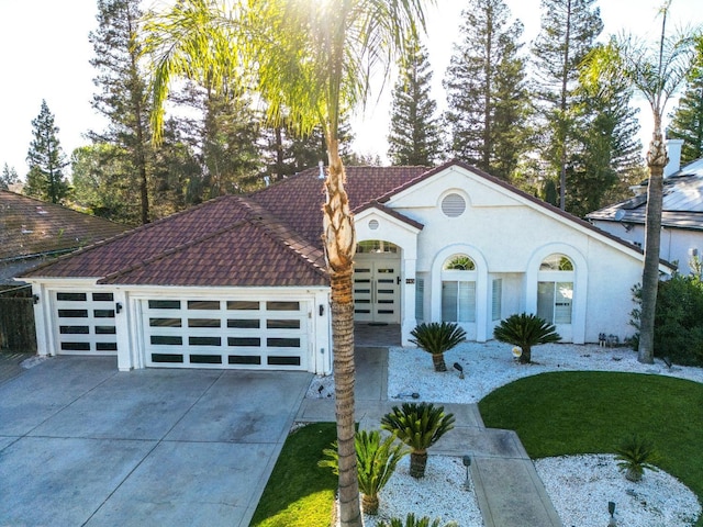 view of front of property featuring a garage