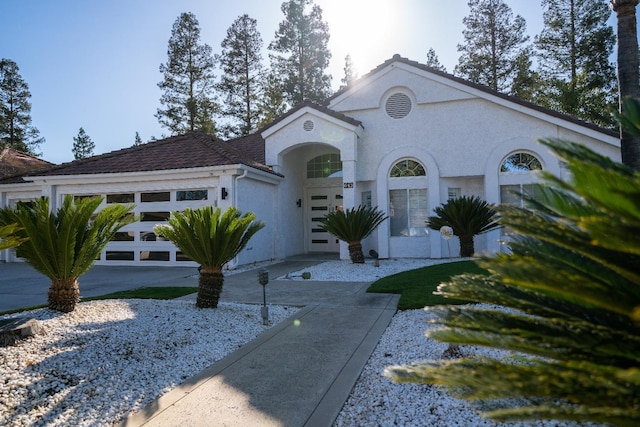 view of front of property with a garage