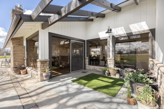 exterior space featuring a pergola and a patio area