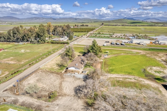 bird's eye view featuring a mountain view and a rural view