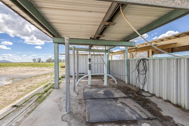 view of patio / terrace with an outbuilding