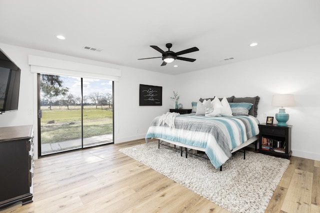 bedroom with ceiling fan, light wood-type flooring, and access to outside