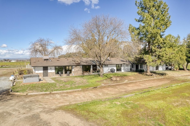 view of front of property with a front yard