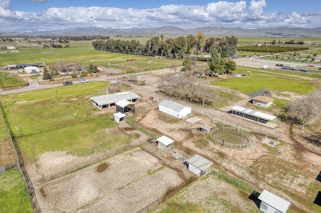 birds eye view of property with a rural view and a mountain view