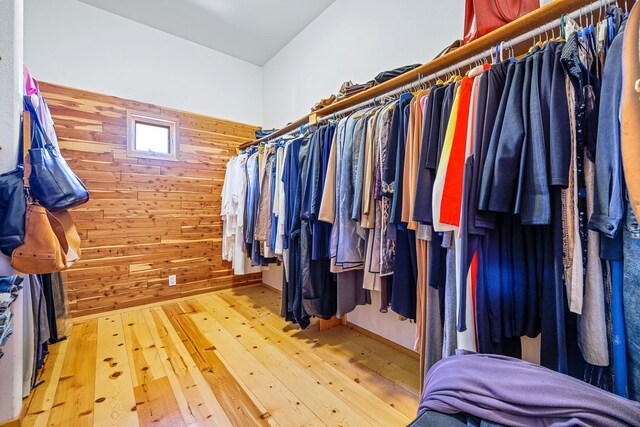 walk in closet featuring wood-type flooring