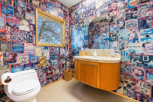 bathroom with vanity and toilet