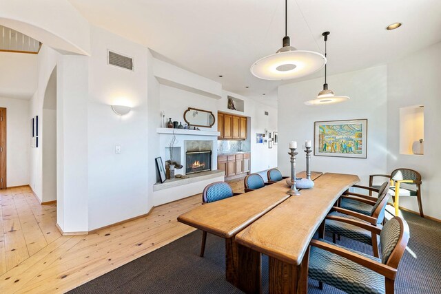 dining area with wood-type flooring