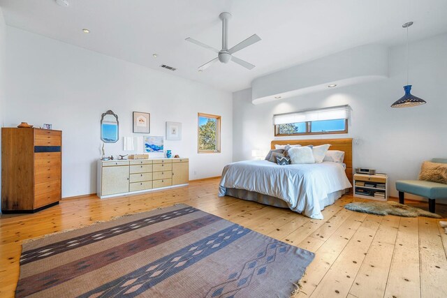 bedroom featuring hardwood / wood-style flooring and ceiling fan