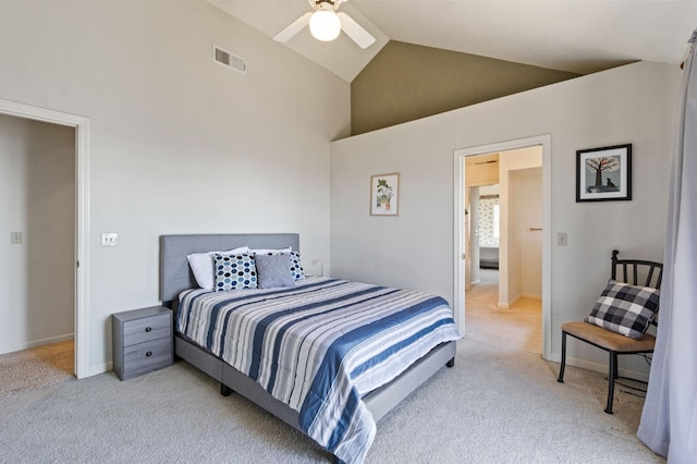 carpeted bedroom featuring high vaulted ceiling and ceiling fan