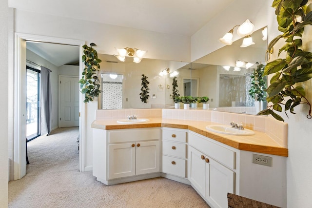 bathroom with dual bowl vanity