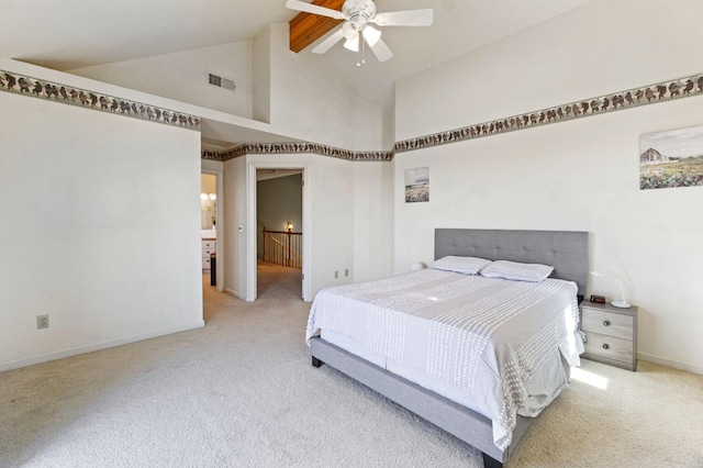 carpeted bedroom with high vaulted ceiling and ceiling fan