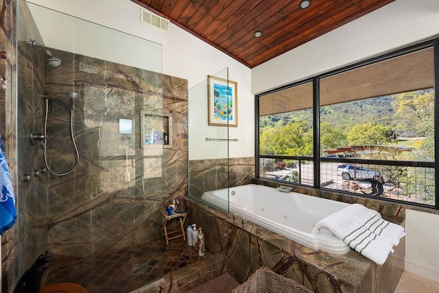 bathroom with lofted ceiling, an enclosed shower, and wood ceiling