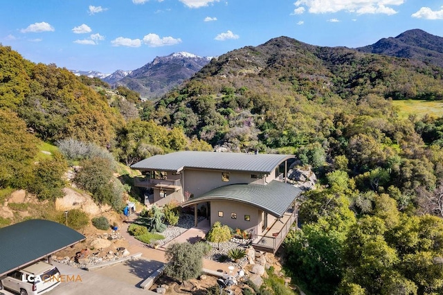 exterior space featuring a mountain view