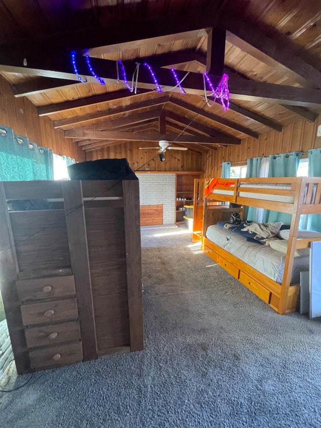 interior space with vaulted ceiling with beams, wooden walls, carpet, and wood ceiling