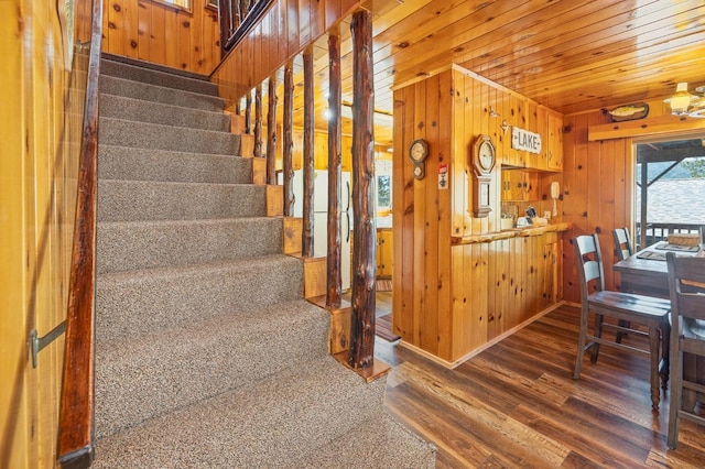 staircase featuring hardwood / wood-style flooring