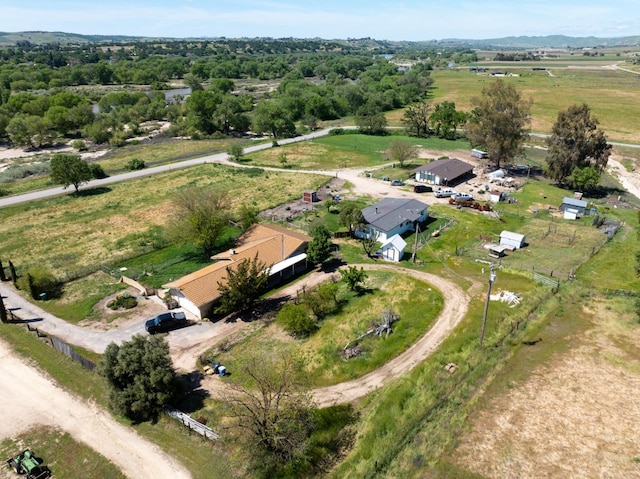 birds eye view of property featuring a rural view