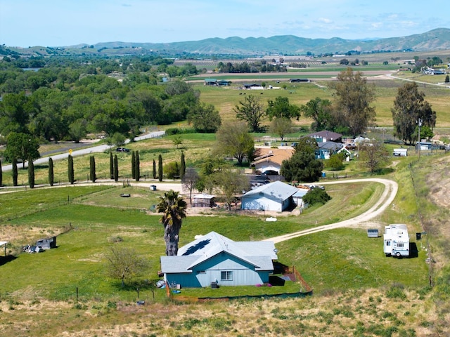 aerial view with a mountain view and a rural view
