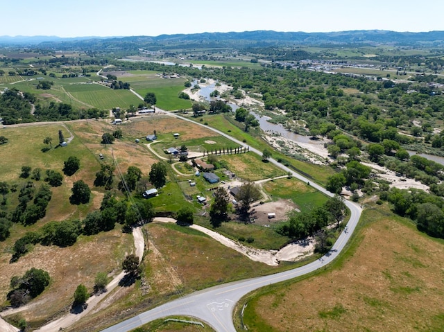 birds eye view of property featuring a rural view
