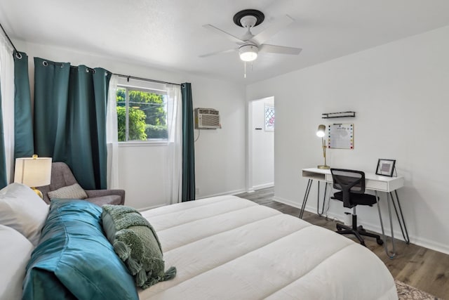 925 S Purdue Ave, Fresno, CA 93727 - bedroom with a wall mounted air conditioner, wood finished floors, baseboards, and a ceiling fan