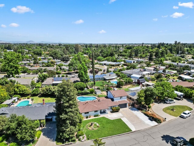 925 S Purdue Ave, Fresno, CA 93727 - aerial view of residential area with a pool and a tree filled landscape