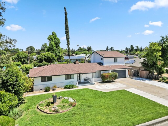 925 S Purdue Ave, Fresno, CA 93727 - view of front of property featuring driveway, a garage, brick siding, and a shingled roof