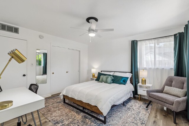925 S Purdue Ave, Fresno, CA 93727 - bedroom with wood finished floors, a closet, and ceiling fan