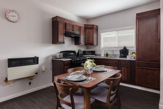 925 S Purdue Ave, Fresno, CA 93727 - kitchen featuring stainless steel microwave, black gas stove, dark wood-style floors, a sink, and heating unit