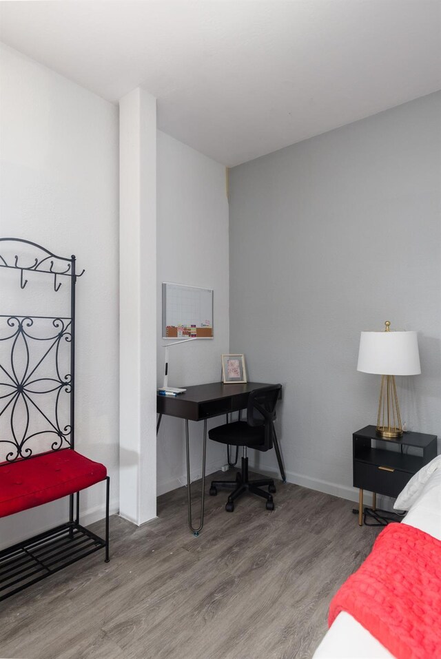 925 S Purdue Ave, Fresno, CA 93727 - bedroom with wood finished floors, baseboards, and an office area