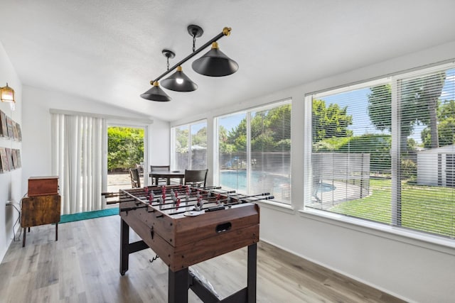 925 S Purdue Ave, Fresno, CA 93727 - rec room with lofted ceiling, light wood-style flooring, and baseboards