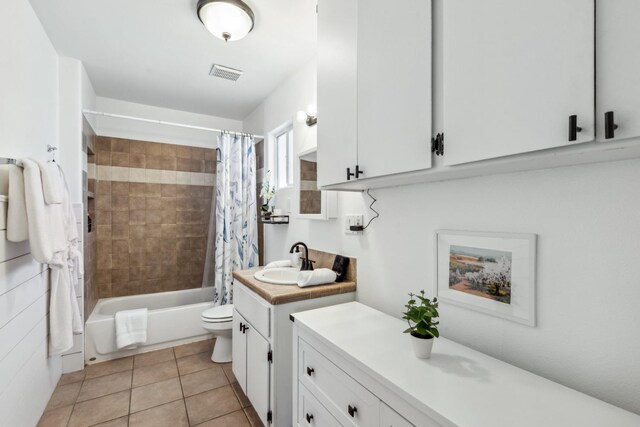 925 S Purdue Ave, Fresno, CA 93727 - full bath with vanity, shower / bath combo, toilet, and tile patterned flooring