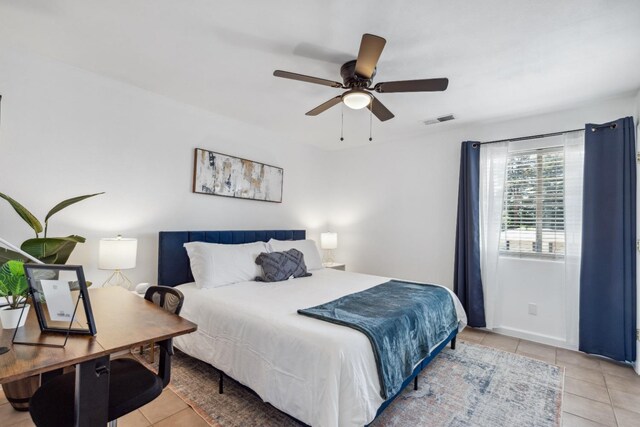 925 S Purdue Ave, Fresno, CA 93727 - bedroom with light tile patterned flooring and ceiling fan