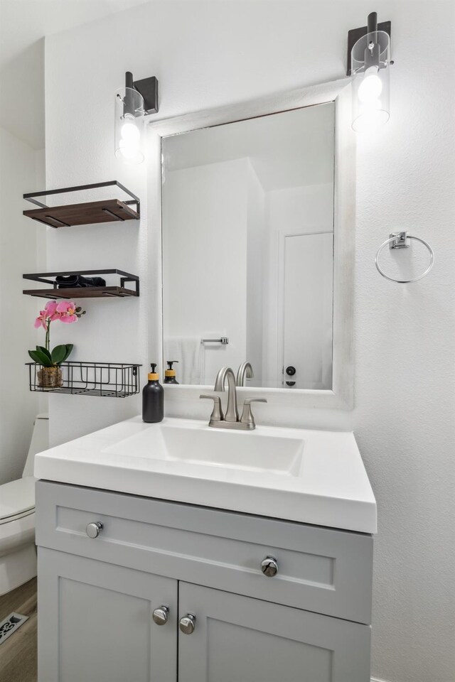 925 S Purdue Ave, Fresno, CA 93727 - bathroom featuring vanity and toilet