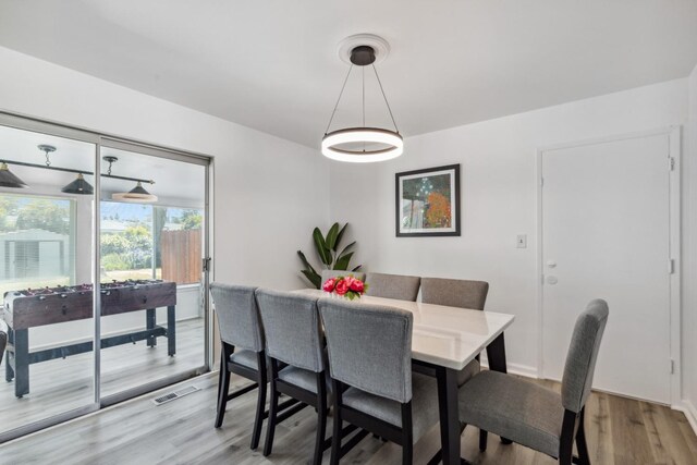 925 S Purdue Ave, Fresno, CA 93727 - dining room featuring light wood-type flooring and baseboards