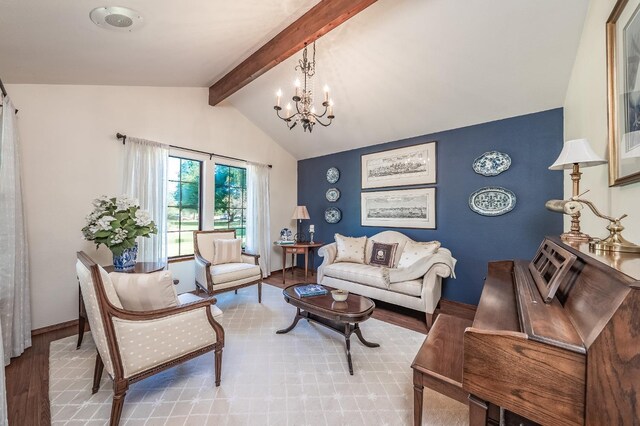 living room featuring light hardwood / wood-style floors, lofted ceiling with beams, and a notable chandelier