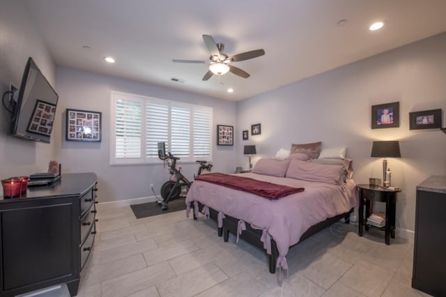 tiled bedroom with ceiling fan