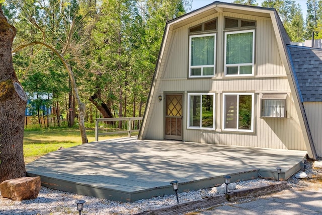 view of front of home featuring a wooden deck