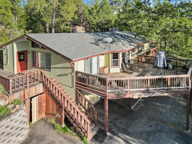 view of front of property with a wooden deck