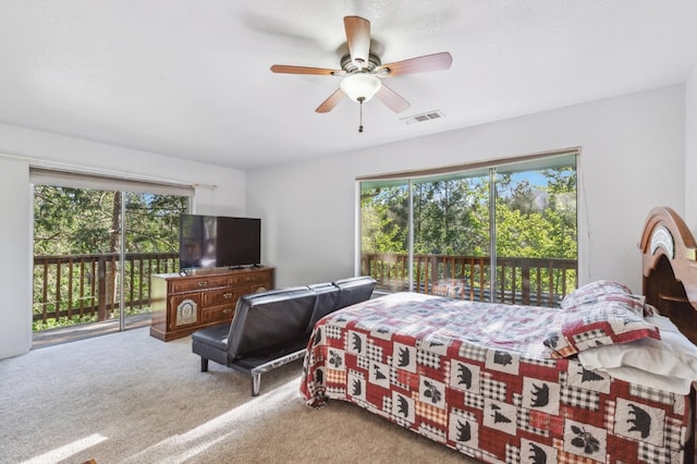 bedroom featuring ceiling fan, access to outside, visible vents, and carpet floors