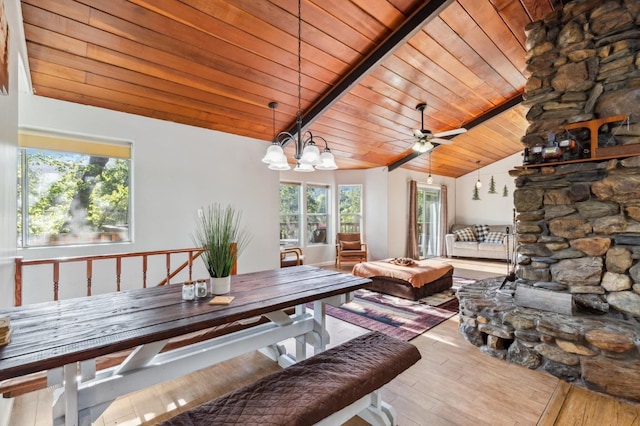 living room featuring wood-type flooring, wooden ceiling, vaulted ceiling with beams, and ceiling fan with notable chandelier