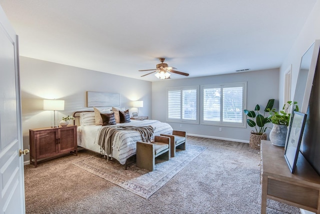 bedroom with ceiling fan and carpet flooring