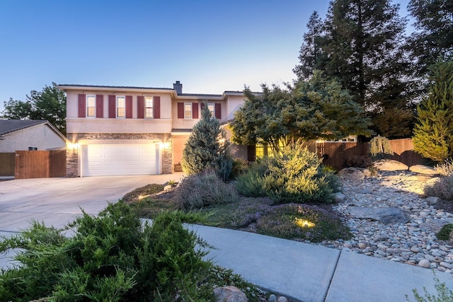 view of front of home with a garage