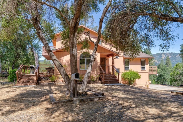 view of front of home with a mountain view