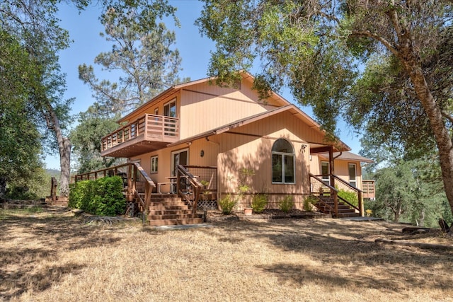 rear view of house with a deck